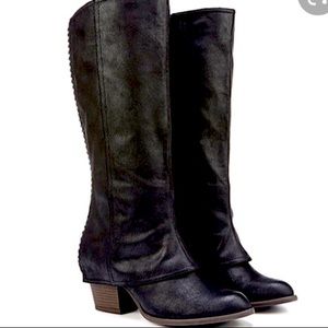 Black crisscross knee high boots